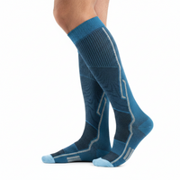 Chaussettes de Compression Sport Unisexe - Bleu - Vue de profil sur jambes d'homme